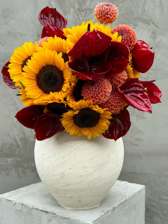 Vibrant Harmony: Sunflowers with Red Anthuriums