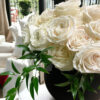 25 roses: white flower arrangement